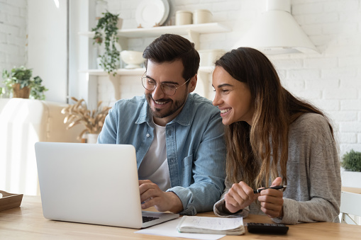 Young couple using computer